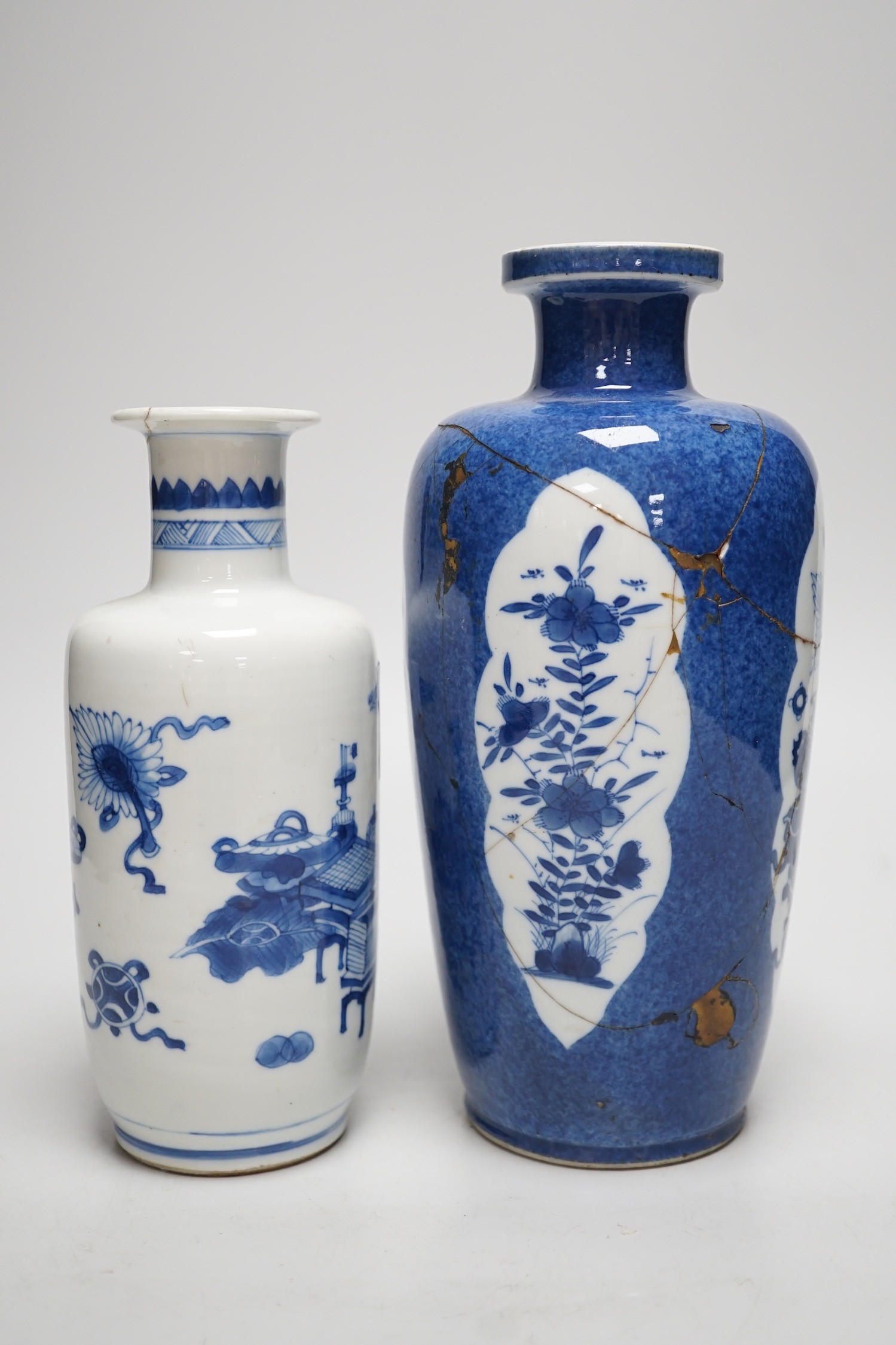 A Chinese blue and white ‘precious objects’ export vase, together with a Chinese powder blue export vase, open vignettes (a.f.) tallest 24.5cms